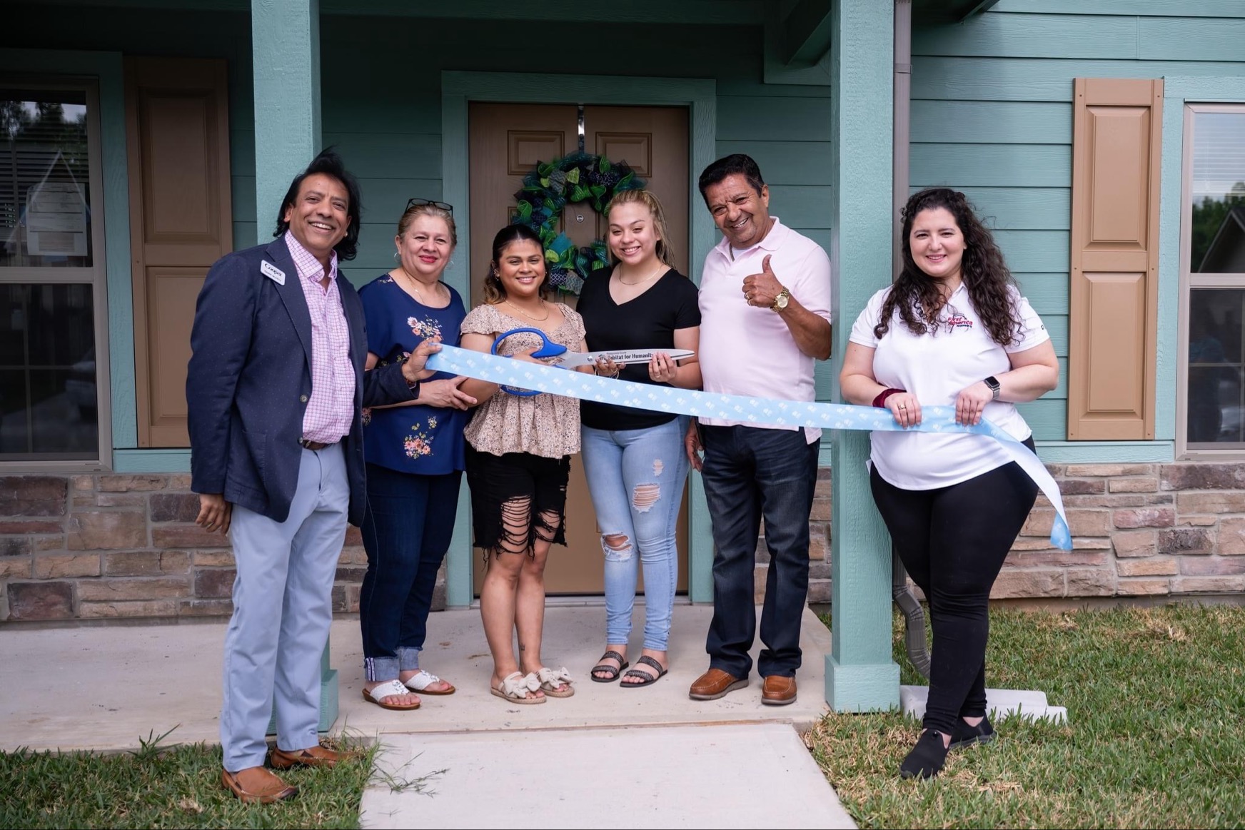 CONROE TX, Habitat for Humanity of Montgomery County held a ribbon cutting ceremony to dedicate a new home to a deserving family Saturday. First America Homes donated labor and sponsored the construction of them new home in Conroe. 
